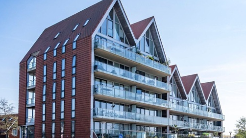 Wat betaalde Sectie5 voor 47 woningen in Hill...